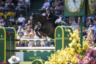 Michael Pender of Ireland and riding HHS Calais compete in the first round of the 1.60m CPKC