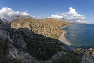 A picture of the Preveli Beach and the Preveli Palm Forest, as well as the nearby landscape and