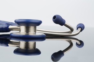Stethoscope against a white background, symbolic photo for the medical profession and diagnostics