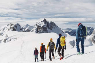 Mountaineer backcountry ski touring in the mountains. Ski touring in high alpine landscape with