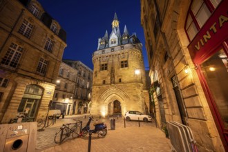 Bordeaux, France, April 17, 2023: Night view of the Porte Cailhau or Porte du Palais. The former