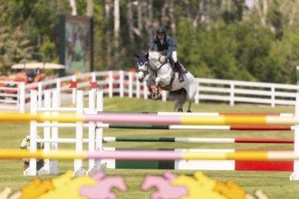 Daniel Bluman of Israel and riding Corbie V.V., compete in the 1.60m Grand Prix during The