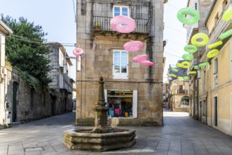 Beautiful View of Residential Building with decorative elements hanging above - Pontevedra, Spain,