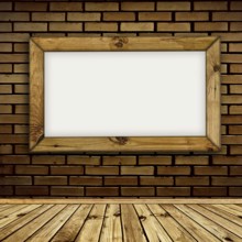 Wooden frame on the brick wall