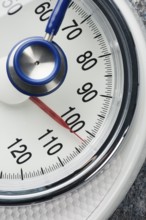 Stethoscope and scales, symbolic photo for weight, diet and heart disease