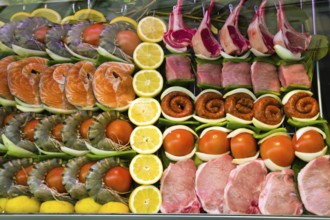 In a fish restaurant, fish lie in a display case ready for preparation. Austria