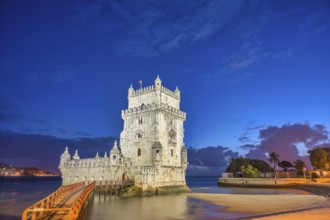 Lisbon Portugal, night city skyline at Belem Tower