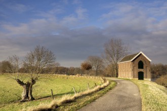 Dyke warehouse along the river Maas near the Dutch village Appeltern. These warehouses were used in