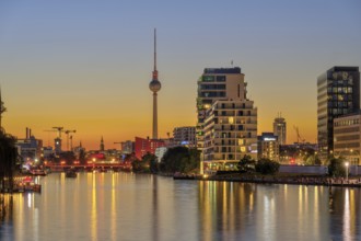 The Spree in Berlin after sunset with the famous television tower in the background