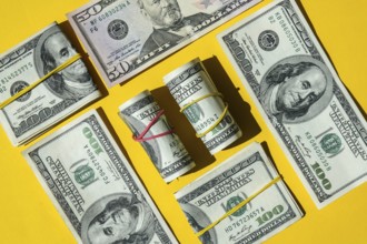Us dollar bills are creative layout. Business concept, development perspective. Flat lay. Top view.