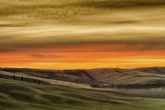 A beautiful sunrise over the hills of Tuscany
