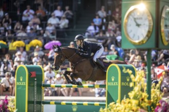 Max Kuhner of Austria riding Elektric Blue P compete in the first round of the 1.60m CPKC