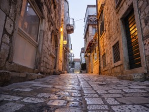Morning atmosphere, narrow alley in the old town centre, town of Hvar, island of Hvar, Dalmatia,
