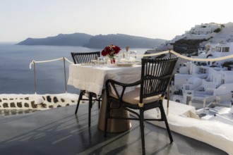 Elegantly laid table, Oia, Santorini, Greece, Europe