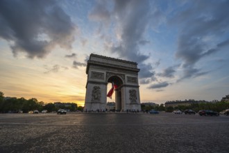 Paris France, city skyline sunset at Arc de Triomphe and Champs Elysees