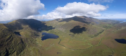 A panorama aerial view of the Mountains of the Central Dingle Peninsula and Connor Pass in County