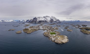 Henningsvaer Fishing Village and Festvagtind Mountain in Winter. Norwegian Sea. Lofoten Islands,