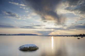 Sunset over a lake, dramatic clouds form in the sky, Seegarten, Allensbach, Lake Constance,
