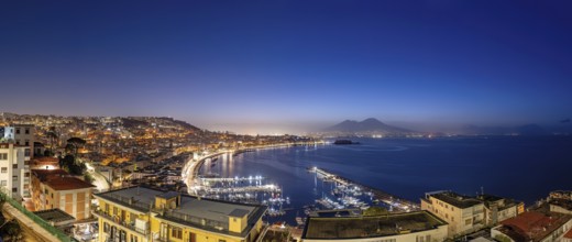 Panorama of Naples with Mount Vesuvius in the background at night