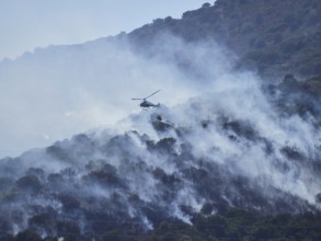 A picture of fire fighters in the sky