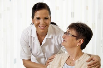 A carer caring for the elderly in a retirement home in Austria