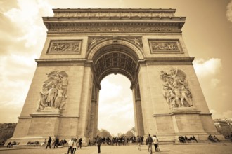 The Arc-de-Triomphe in Paris, France. Toned on sepia (old photograph) . Austria