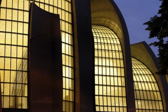 Illuminated windows of the Cologne mosque in the blue hour