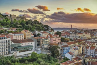 Lisbon Portugal sunset city skyline at Lisbon Baixa district and Saint George Castle