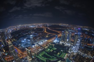 Dubai night view seen from the observation deck of Burj Khalifa. Shooting Location: Dubai