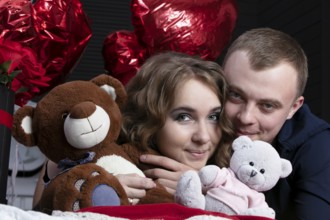Boyfriend and girlfriend on Valentine's Day. Portrait of lovers. A man and a beautiful woman with