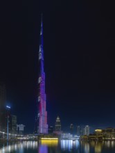 A picture of the iconic Burj Khalifa with its light show, and the surrounding Downtown Dubai