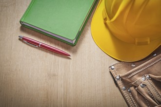Collection of construction equipment on wood board