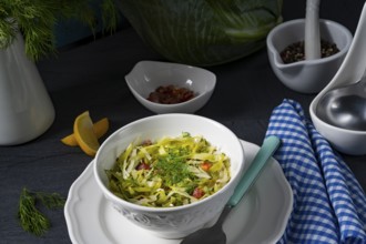 White cabbage with dill and diced bacon
