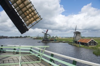Windmills in Holland at Dutch Zaanse Schans taken from a mill