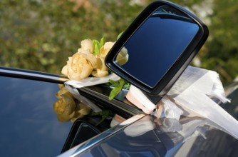 Wedding car decoration - bunch of artificial roses