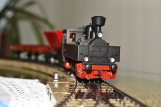 Model railway runs towards the points