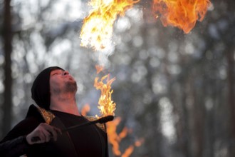 Belarus, Gomel, February 18, 2018. Russian holiday seeing off winter Maslenitsa.A man set fire to