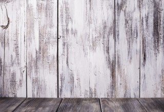 Old shabby white wooden wall and gray floor for design