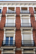 Old residential building in central Madrid. Real estate, renovation and maintenance concepts
