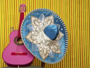 Mariachi embroidery mexican hat pink guitar in striped background