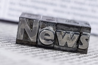 The word News was written in lead letters. Symbol photo for newsletters, newspapers and Information