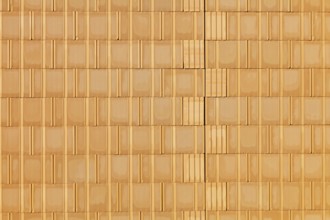 A new brick wall at a building shell house on a construction site. Background. Austria
