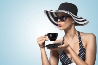 A creative vintage photo of a beautiful pin up girl drinking tea and showing good table manners