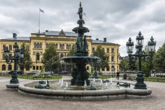 Sundsvall, Vastnorrland County, 08 02 2019: Esplanade and city fountain in old town