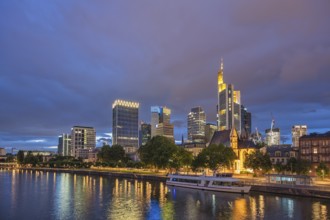 Frankfurt Germany, night city skyline at Main River and business skyscraper