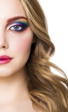 Close up portrait of a beautiful young blond model with bright make up. Close up of abstract