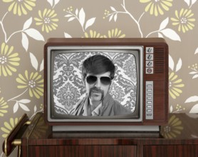 Nerd retro 60s vintage tv presenter hero on wood television wallpaper