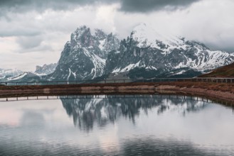 Water reservoir on the Seiser Alm in the Dolomites in South Tyrol, Italy, Europe