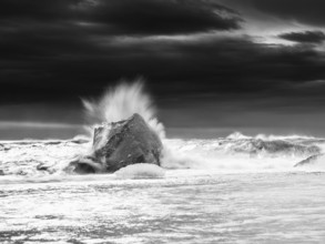 Diamond Beach, iceberg in the surf, near Jökulsarlon glacier lagoon, Vatnajökull National Park,