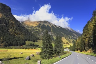 The famous Alpine road Grossglocknershtrasse. The autumn in the Austrian Alps. The beautiful sunny
